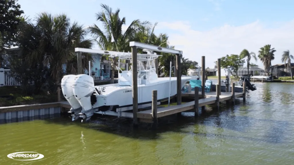 Category 5 13k and 7k boat lifts, side-by-side comparison on waterfront.